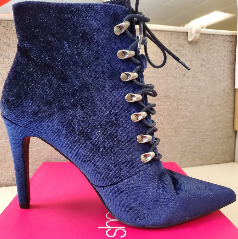 Brand new, never worn booties.